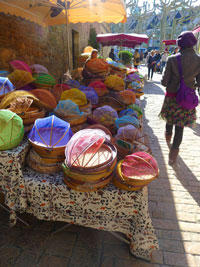 Colourful covers in Sarlat market